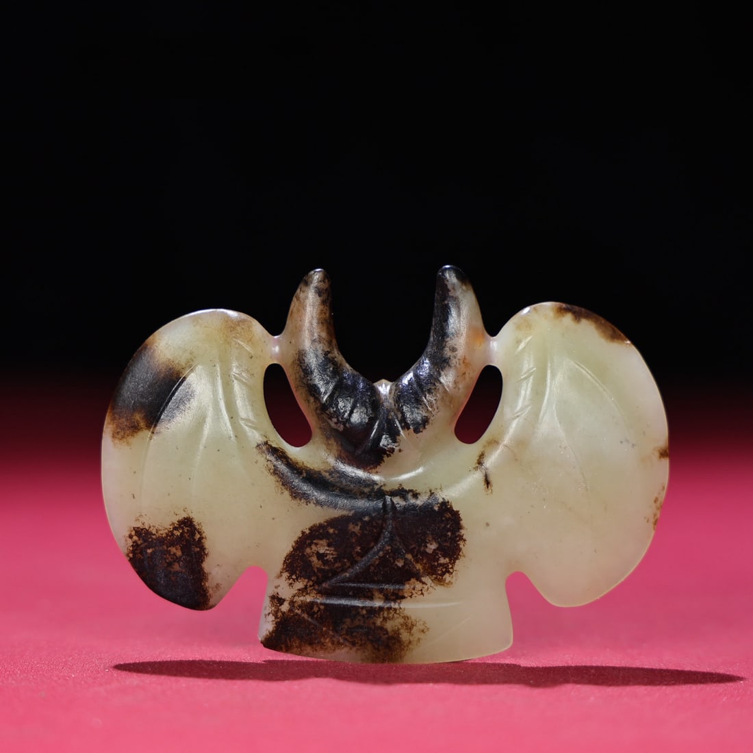 A Chinese Carved Jade Pendant: A Chinese Carved Jade Pendant. Lg. 5.6cm, Wd. 8.2cm, Th. 1.2cm, Wt. 64g
