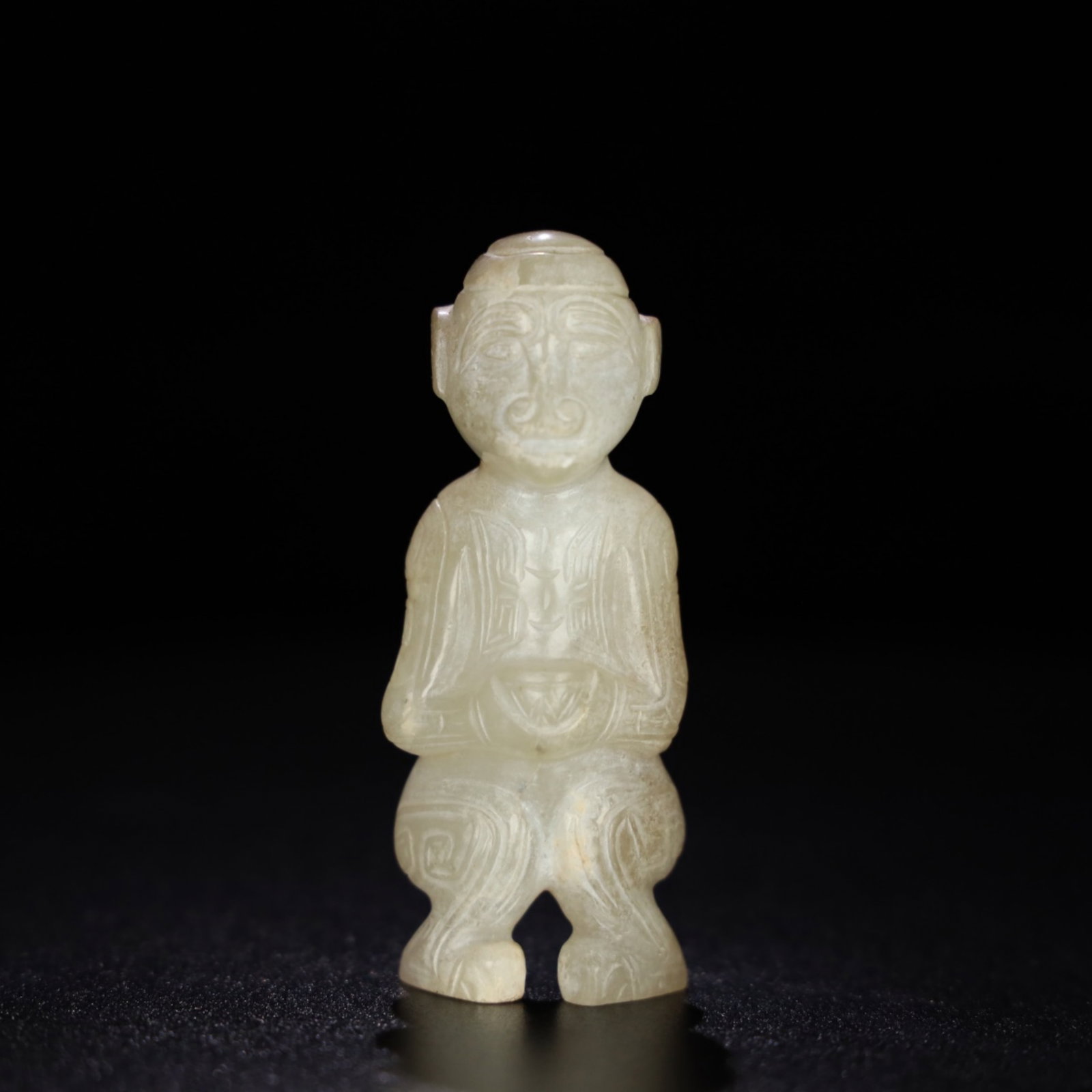 A Chinese Carved Jade Figure: A Chinese Carved Jade Figure. Lg. 3.2cm, Ht. 8.1cm, Wd. 2.7cm, Wt. 85.7g