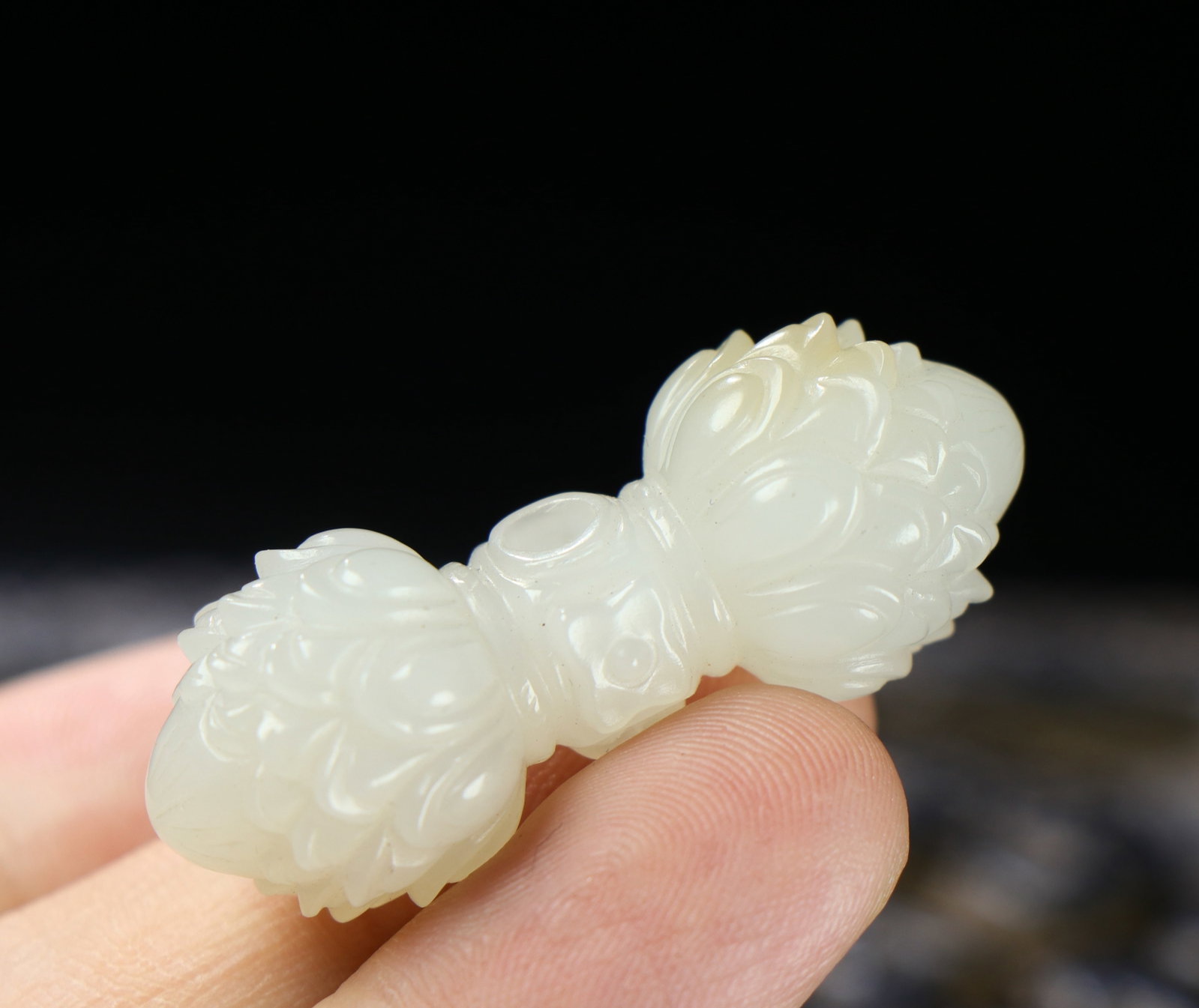 A Chinese Carved Jade Buddhist Instrument (1 of 9)
