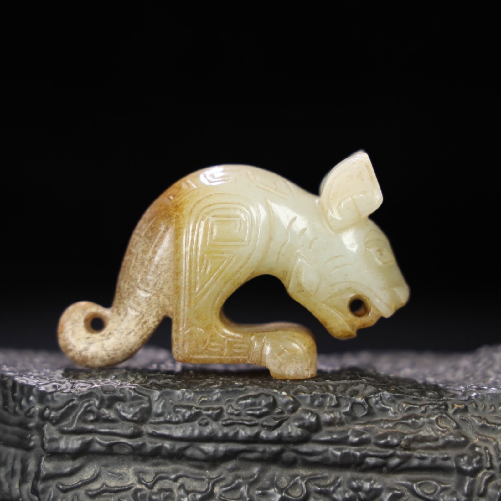 A Chinese Carved Jade Dragon Statuette: A Chinese Carved Jade Dragon Statuette. Lg. 7cm, Wd. 2.6cm, Ht. 4.5cm, Wt. 93g