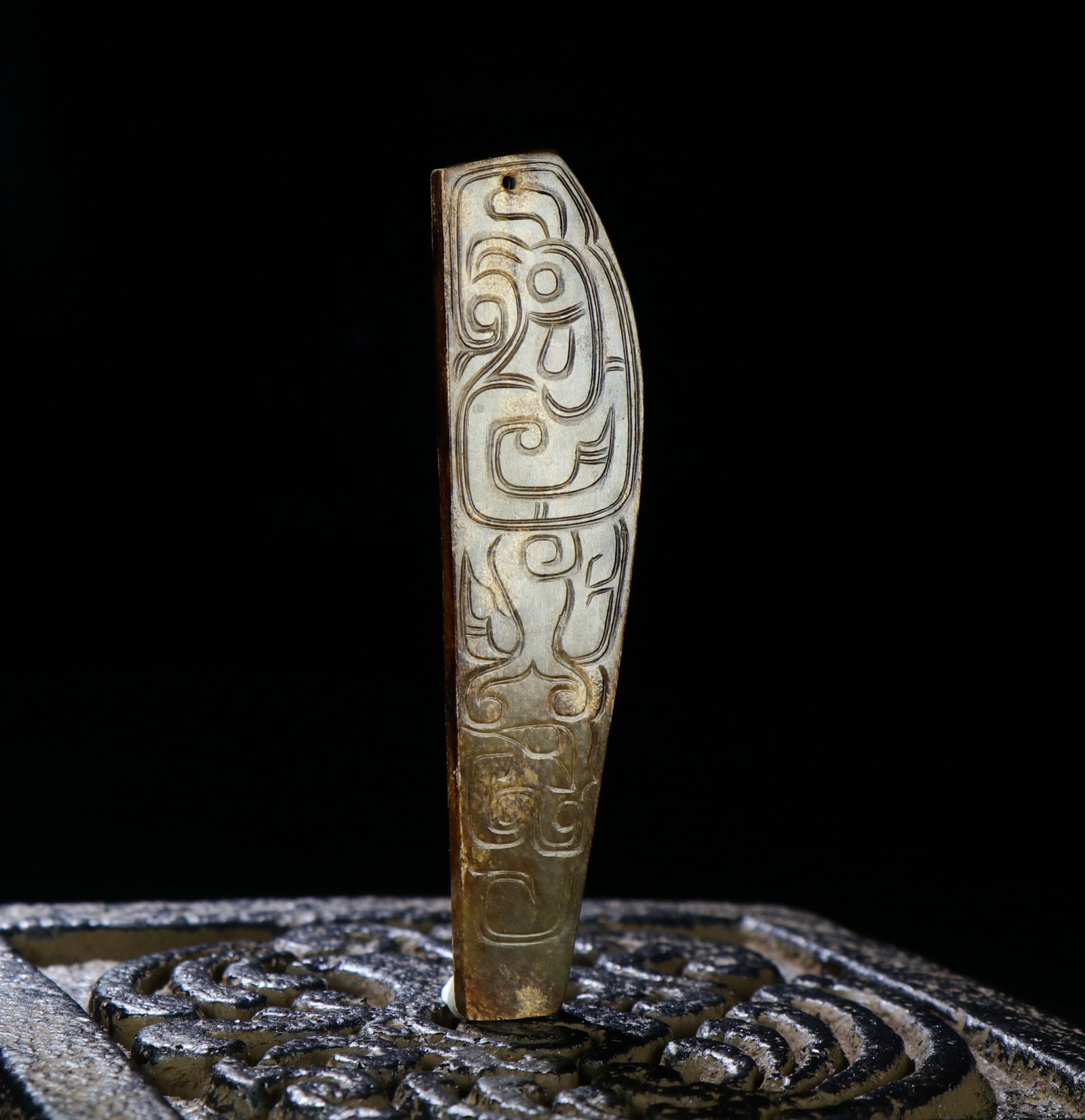 A Chinese Carved Jade Phoenix Pendant: A Chinese Carved Jade Phoenix Pendant. Ht. 9.7cm, Wd. 2.3cm, Wt. 25g