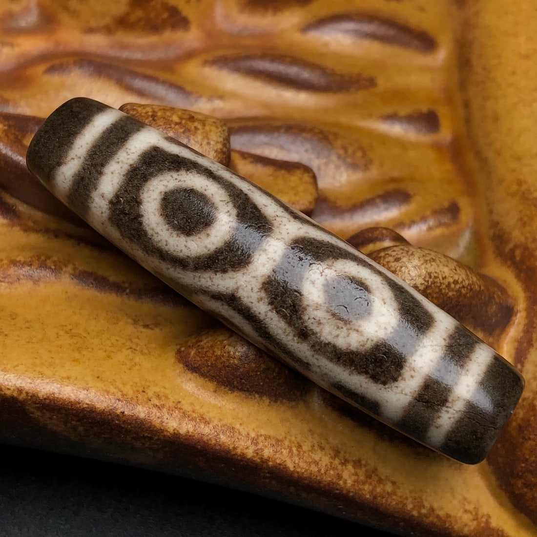 A Chinese Carved Agate DZI Bead (1 of 9)