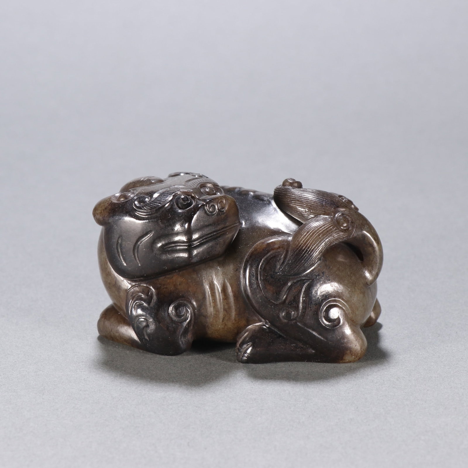 A Chinese Carved Jade Foo-Dog Statuette (1 of 9)