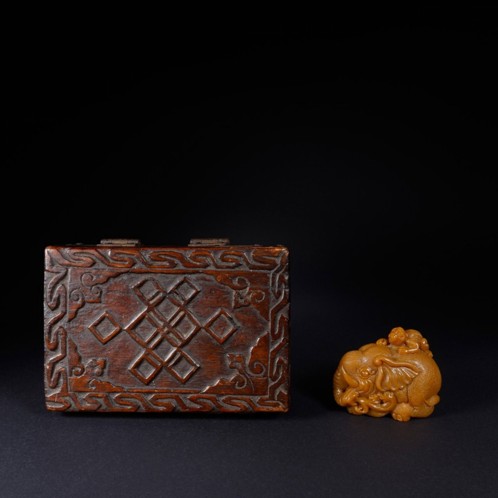 A Chinese Carved Stone Elephant and Monkey: A Chinese Carved Stone Elephant and Monkey. Lg. 6.9cm, Wd. 3.6cm, Ht. 5.7cm, Wt. 188g