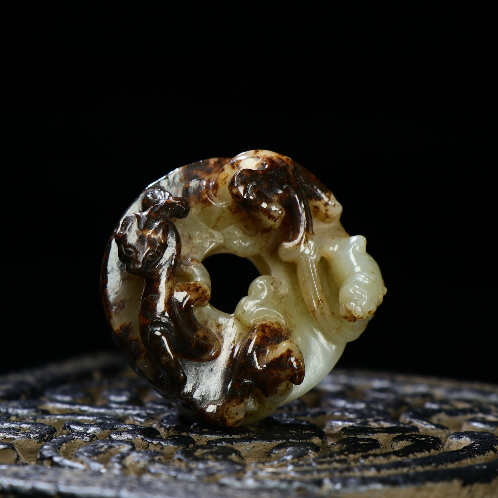 A Chinese Carved Jade Dragon Pendant: A Chinese Carved Jade Dragon Pendant. Diam. 4.8cm, Th. 2cm, Wt. 47g