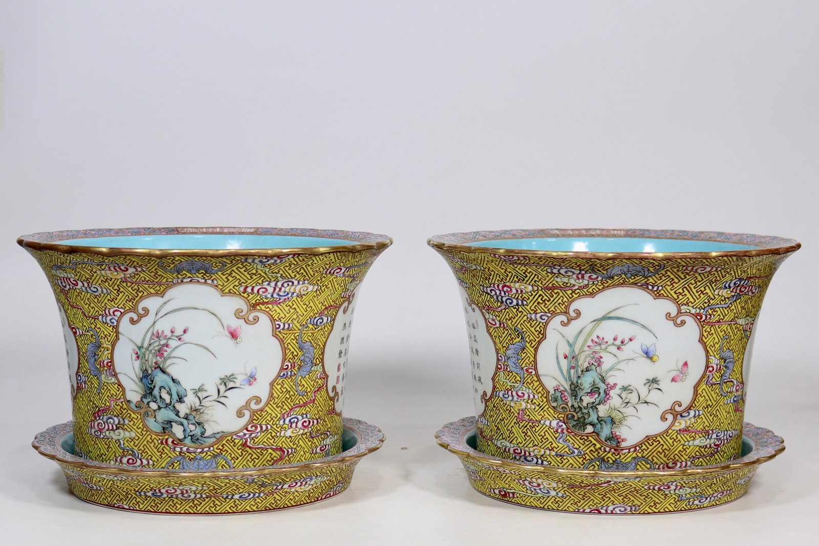 A Pair of Chinese Yellow Ground Famille-Rose Porcelain Planters with Stands: A Pair of Chinese Yellow Ground Famille-Rose Porcelain Planters with Stands. Ht. 18.5cm, Diam. 27cm