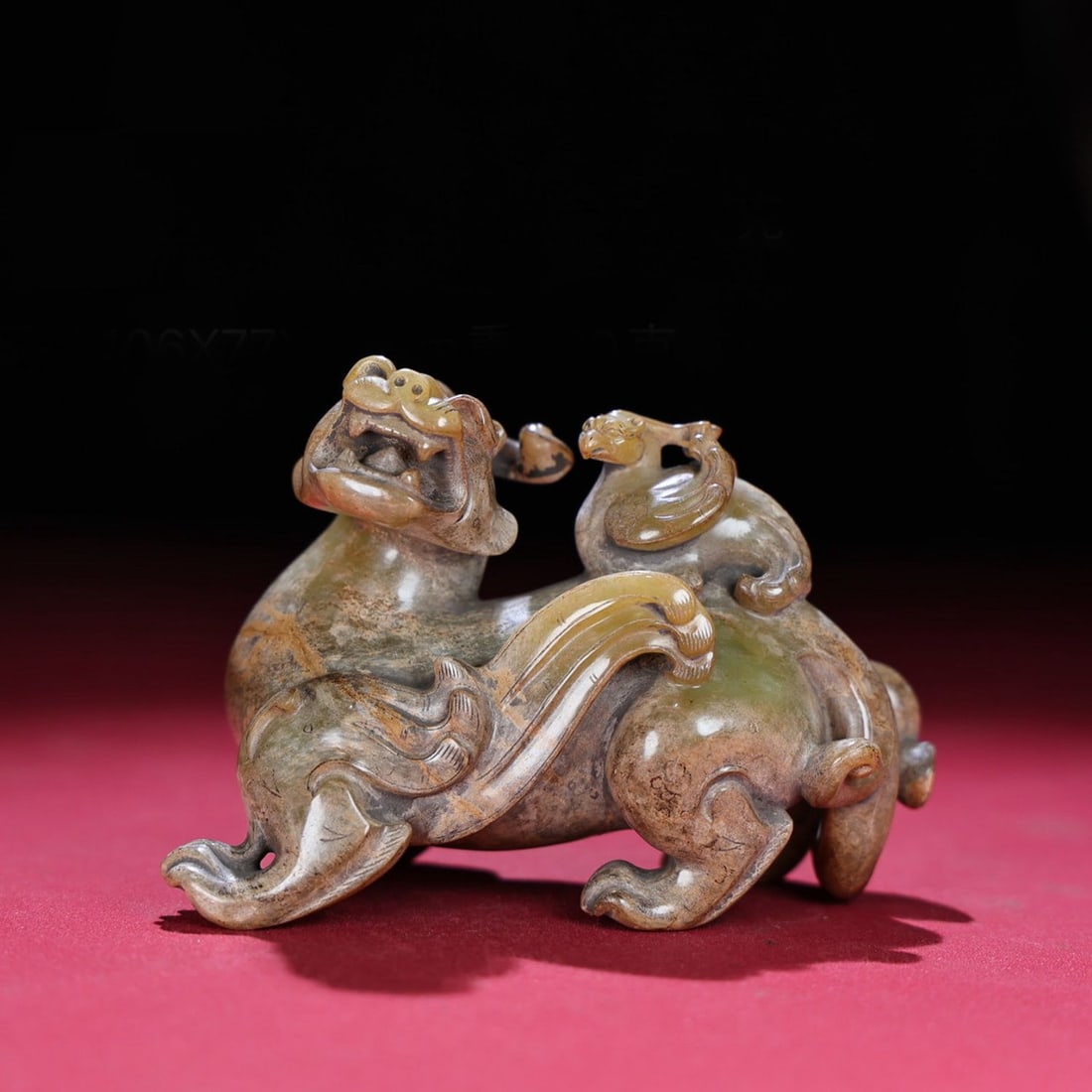 A Chinese Carved Jade Foo-Dog Statuette (1 of 9)