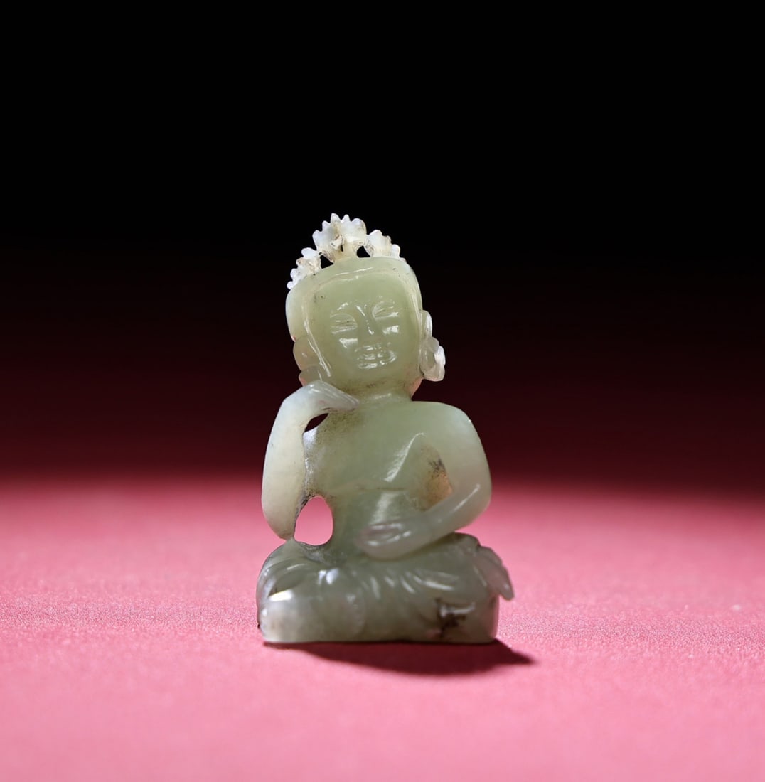 A Chinese Carved Jade Figure of Buddha: A Chinese Carved Jade Figure of Buddha. Ht. 4.6cm, Wd. 2.7cm, Th. 2.5cm, Wt. 27g