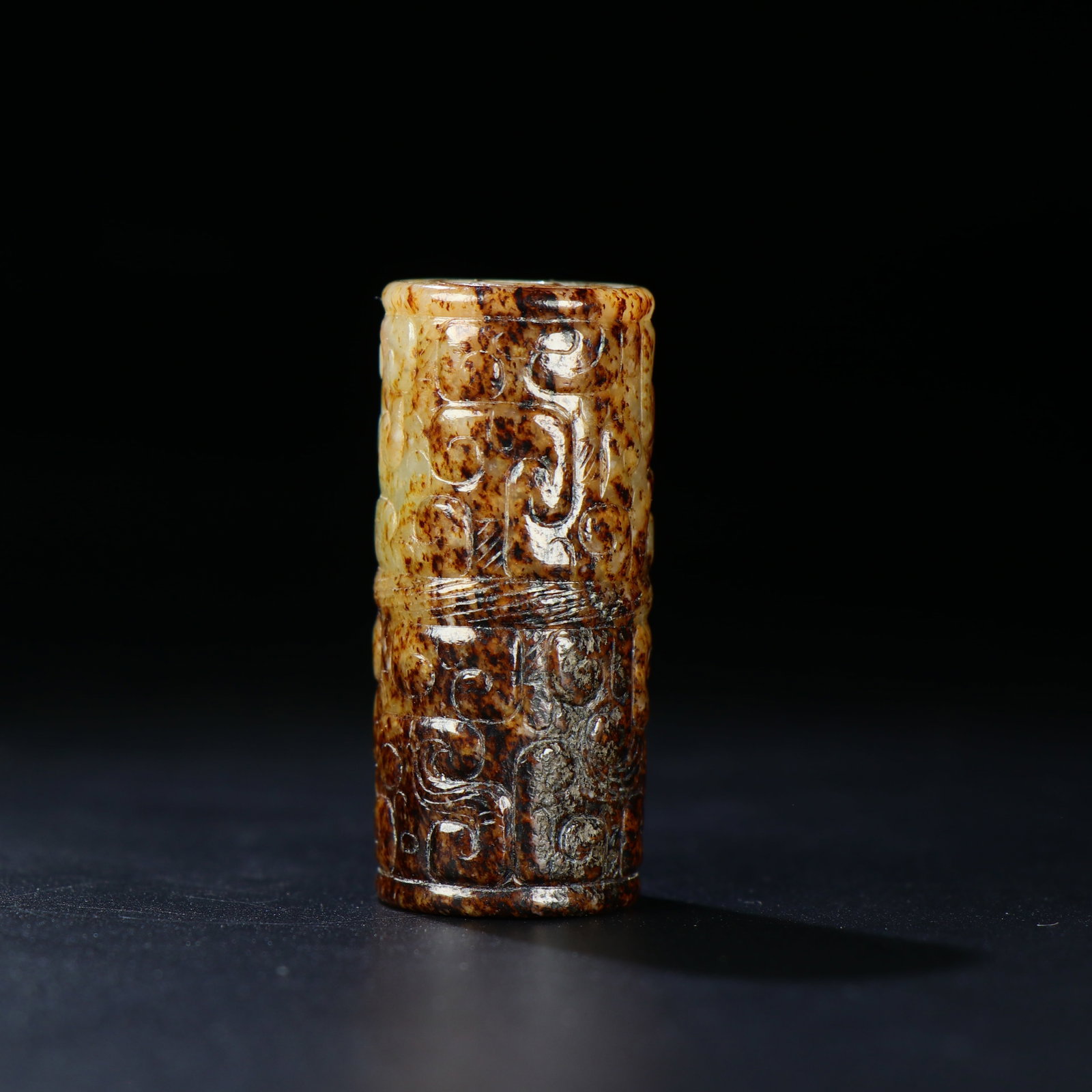 A Chinese Carved Jade Bead: A Chinese Carved Jade Bead. Lg. 4.7cm, Diam. 2.0cm, Wt. 43g
