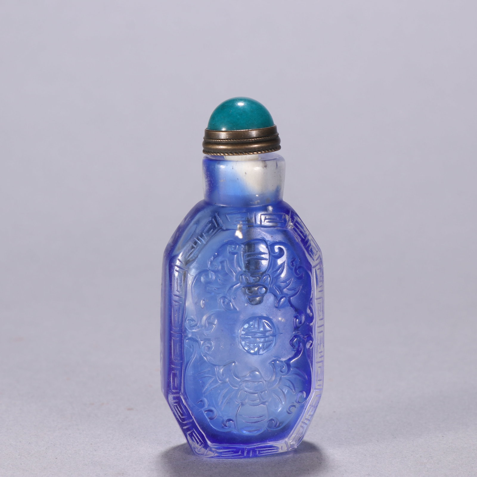 A Chinese Carved Peking Glass Snuff Bottle (1 of 9)