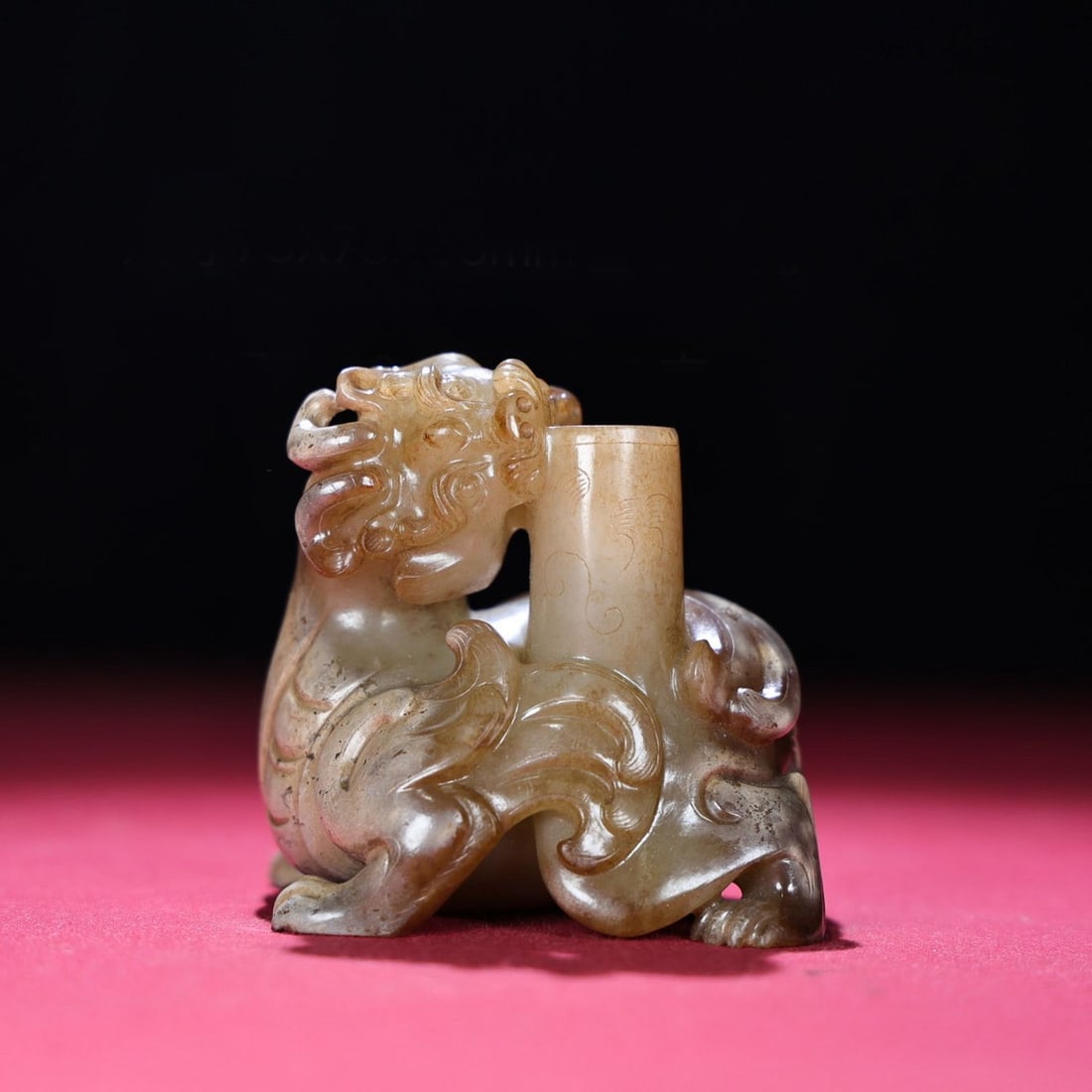 A Chinese Carved Jade Foo-Dog Statuette: A Chinese Carved Jade Foo-Dog Statuette. Lg. 7.3cm, Wd. 7.3cm, Th. 6.3cm, Wt. 389g