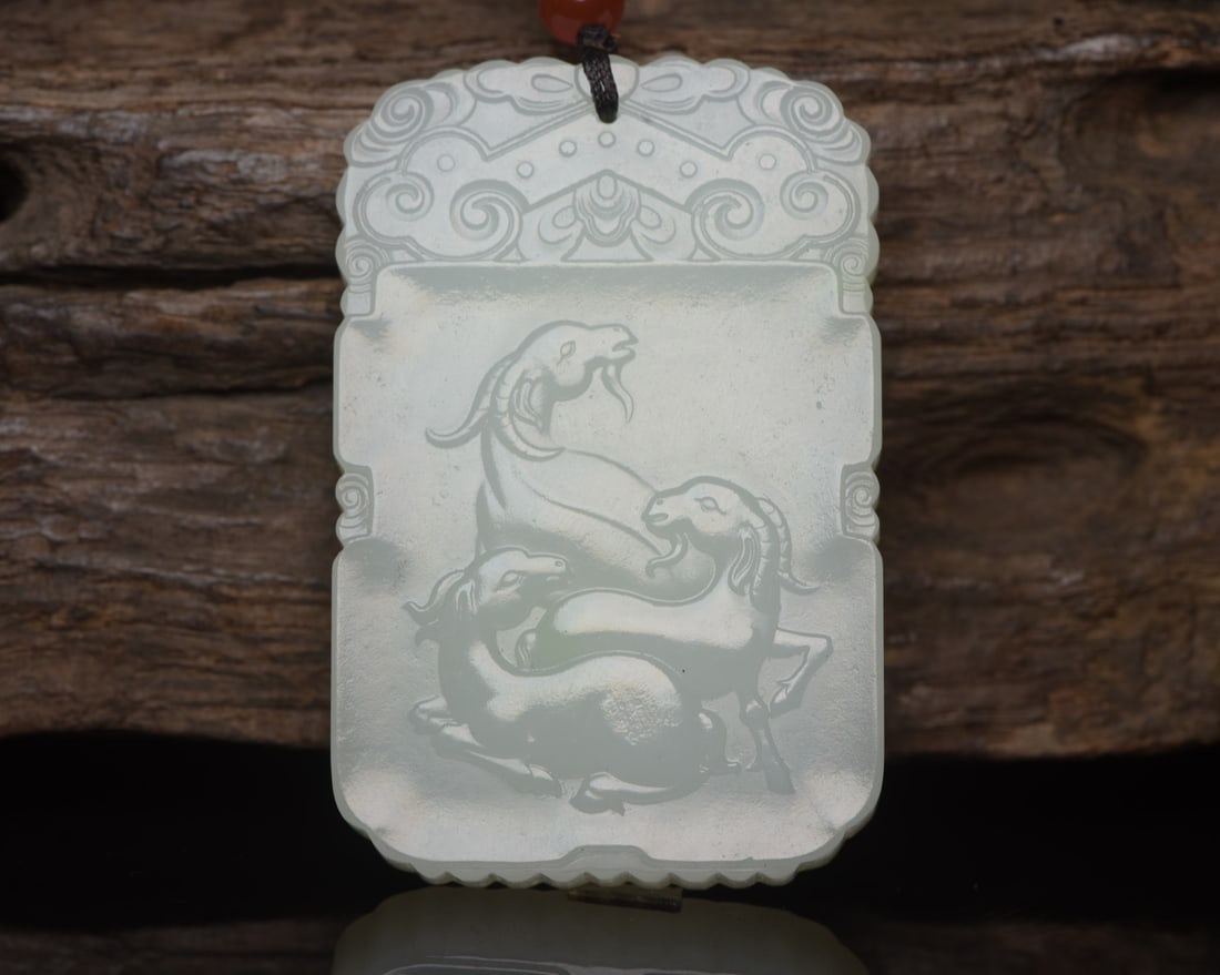 A Chinese Carved Jade Pendant: A Chinese Carved Jade Pendant. Ht. 6cm, Wd. 4cm, Ht. 0.8cm, Wt. 57g