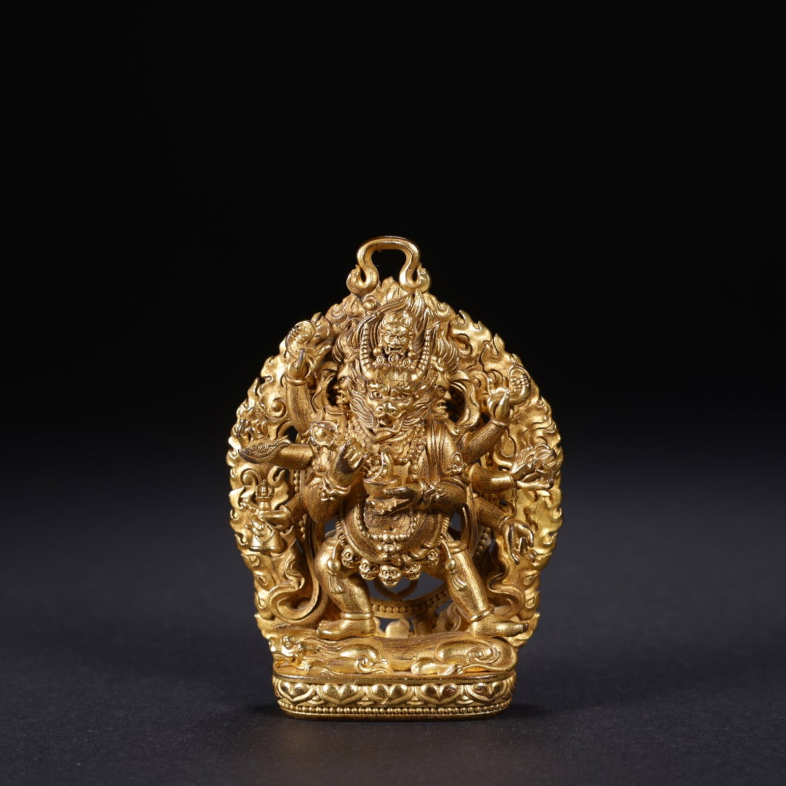 A Chinese Gilt Bronze Figure of Buddha Pendant: A Chinese Gilt Bronze Figure of Buddha Pendant. Lg. 4.2cm, Wd. 1.6cm, Ht. 5.8cm, Wt. 71g