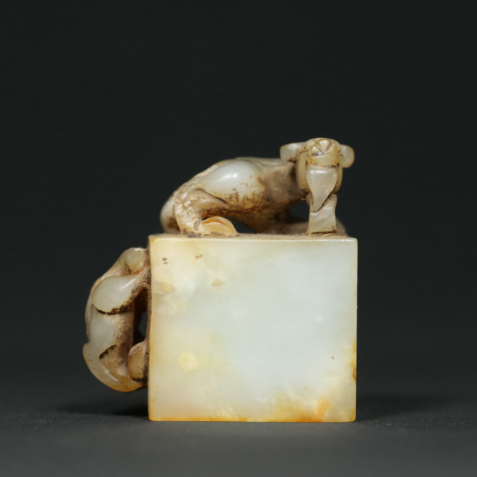 A Chinese Carved Jade Seal with Dragon Handle: A Chinese Carved Jade Seal with Dragon Handle. Ht. 4.5cm, Wd. 4.3cm, Th. 2.6cm, Wt. 88.6g