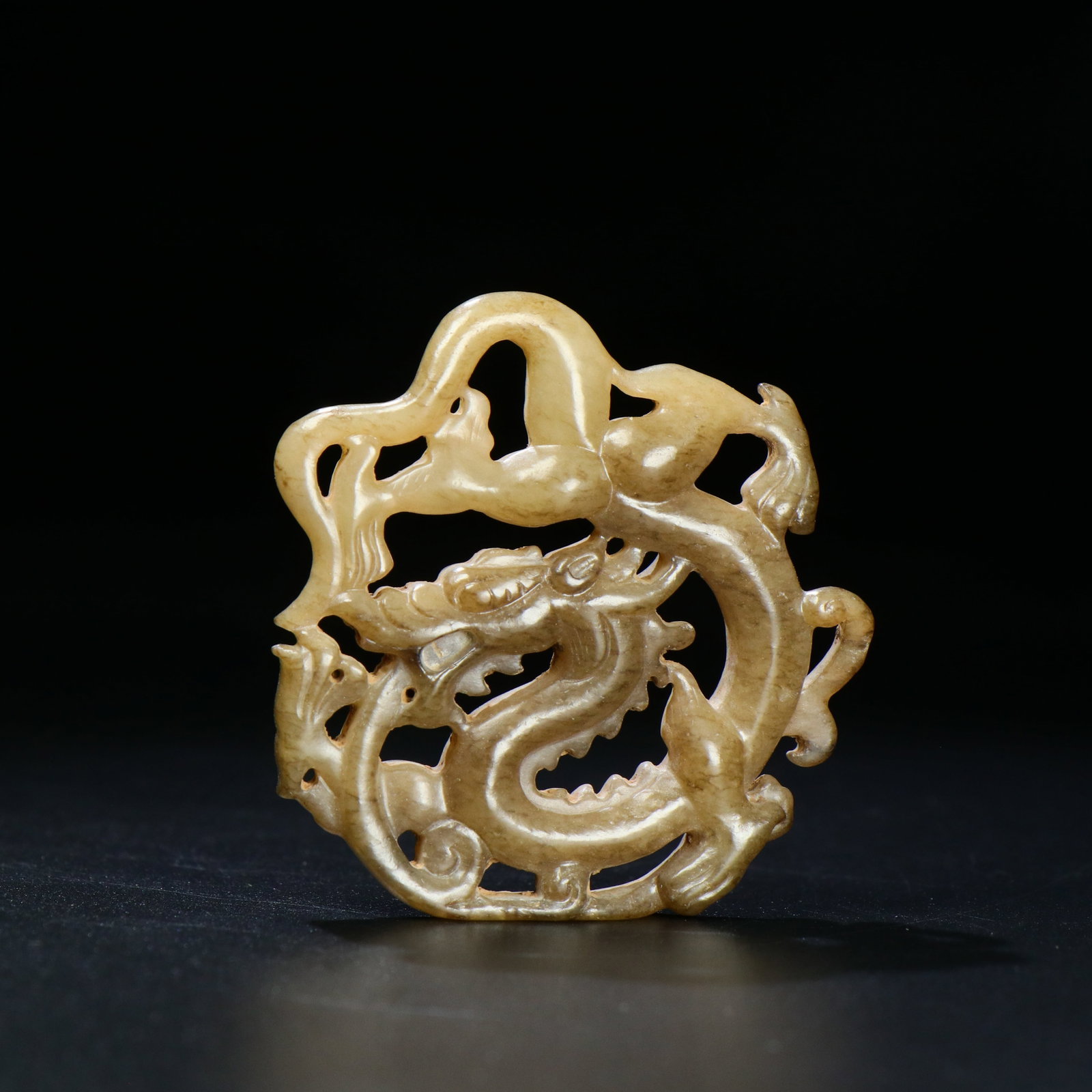 A Chinese Carved Jade Dragon Pendant: A Chinese Carved Jade Dragon Pendant. Ht. 5.2cm, Wt. 20g