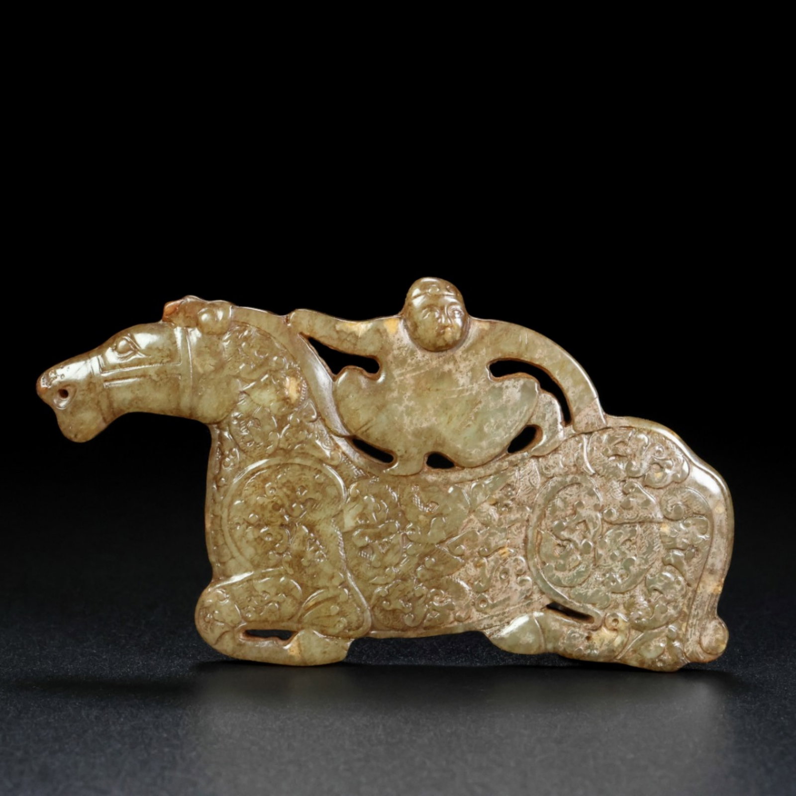 A Chinese Carved Jade Horse with Rider Pendant: A Chinese Carved Jade Horse with Rider Pendant. Wt. 73.6g, Lg. 11cm, Ht. 6cm, Th. 0.5cm
