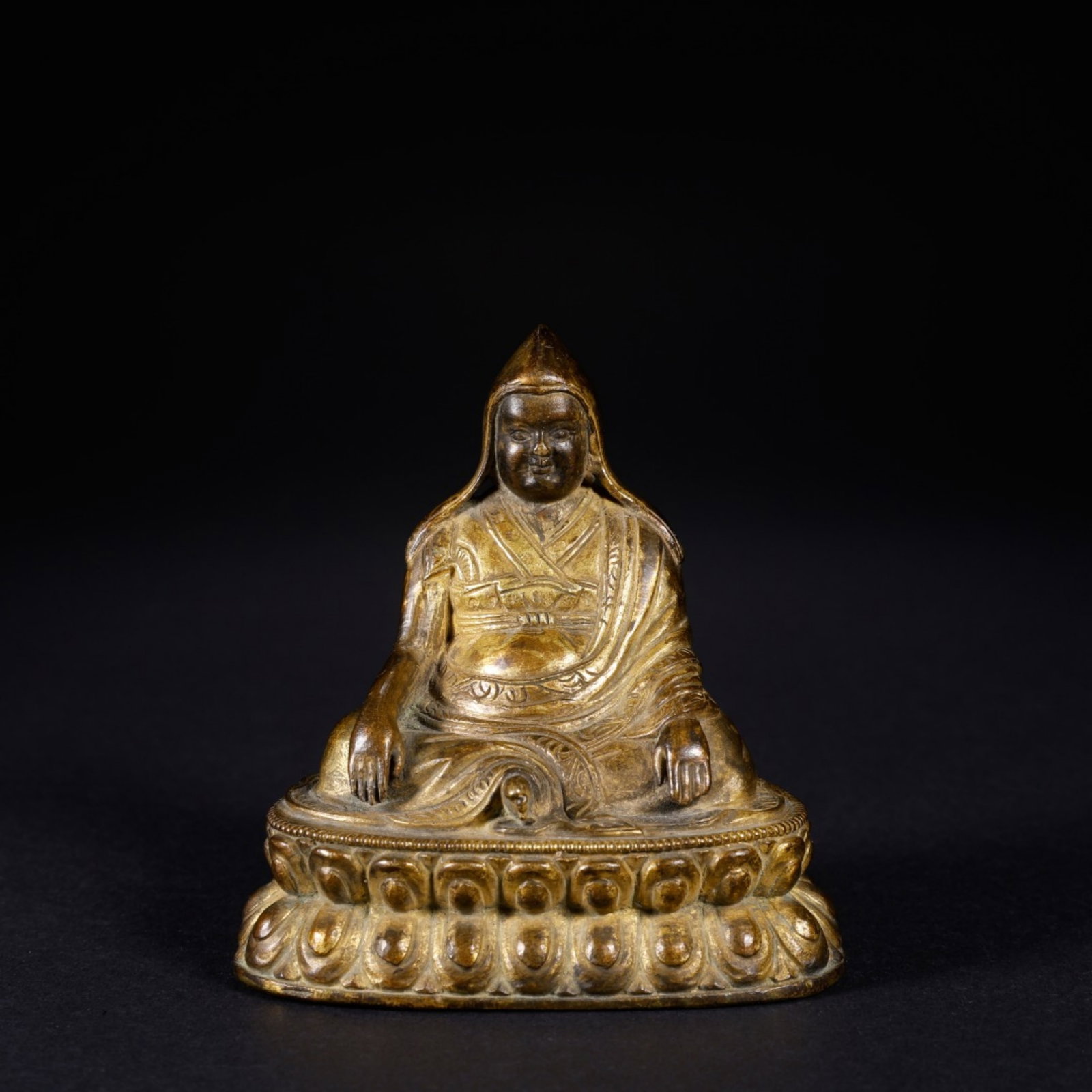 A Chinese Gilt Bronze Figure of Buddha: A Chinese Gilt Bronze Figure of Buddha. Lg. 6.4cm, Wd. 4.7cm, Ht. 6.8cm, Wt. 267g