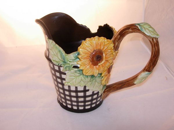 Fritz & Floyd 1992 1 1/4 quart pitcher depicting fl: Fritz & Floyd 1992 1 1/4 quart pitcher depicting floral vase with sunflowers, measures 8"