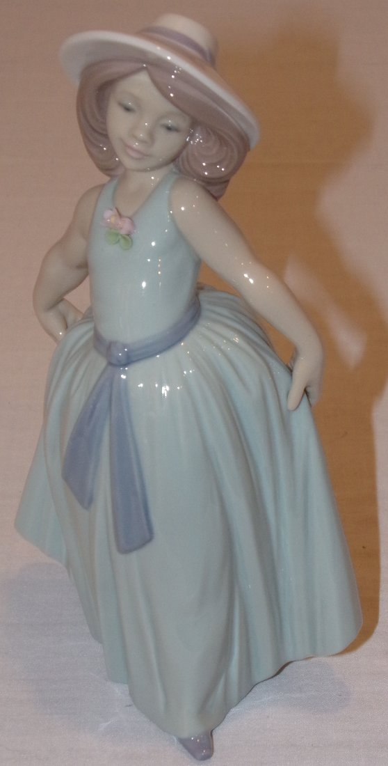 Lladro Figure: Lladro porcelain figurine, young girl in long pale green dress, posing incised 6275, approx. 7” T