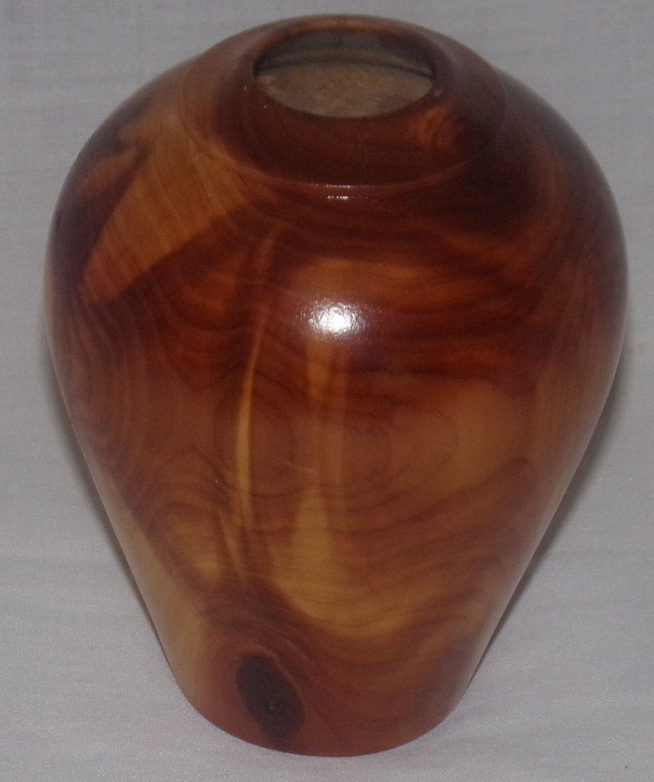 Wood Turned Vase: Small cedar wood turned vase marked on bottom B …… (illegible) Cedar dated 11/13/00, approx. 4¼” T x 3¼” top diameter; reproduction Pre-Columbian oval basket identified w/a card describing t