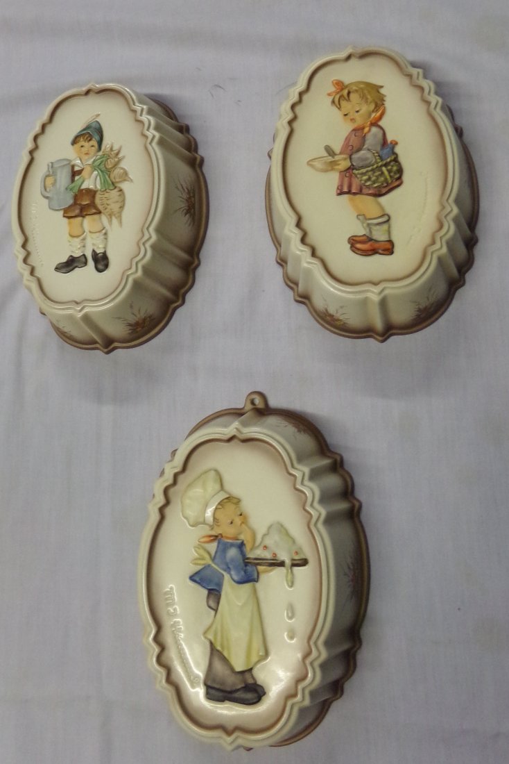 Hummel Molds: Grouping of 6 molds (3 oval/3 round) marked MJ Hummel; each oval 8 1/2" x 6" (1989); each round 7 1/2" diameter (1989) * 1 w/chip visible