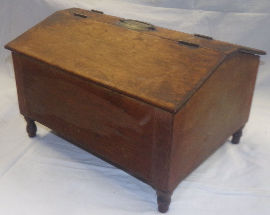 19th C Softwood Box: 19th century softwood box having 2 hinged slant lids with center oval brass bail pull/handle ending on short turned legs, old worn finish, 8 7/8” T x 13 ½” W x 10 ½” D (case dimensions)