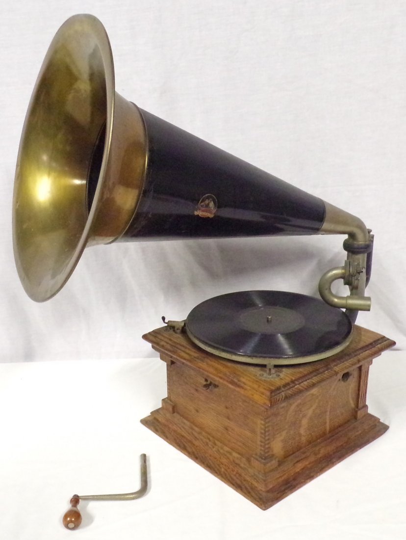 Antique Table Model Phonograph-Victor: Antique table model phonograph by the Victor Talking Machine Co., #34,610, having a square oak case with molded base, machine dovetailed with record disk, crank, recorder, rear cast iron bracket and h