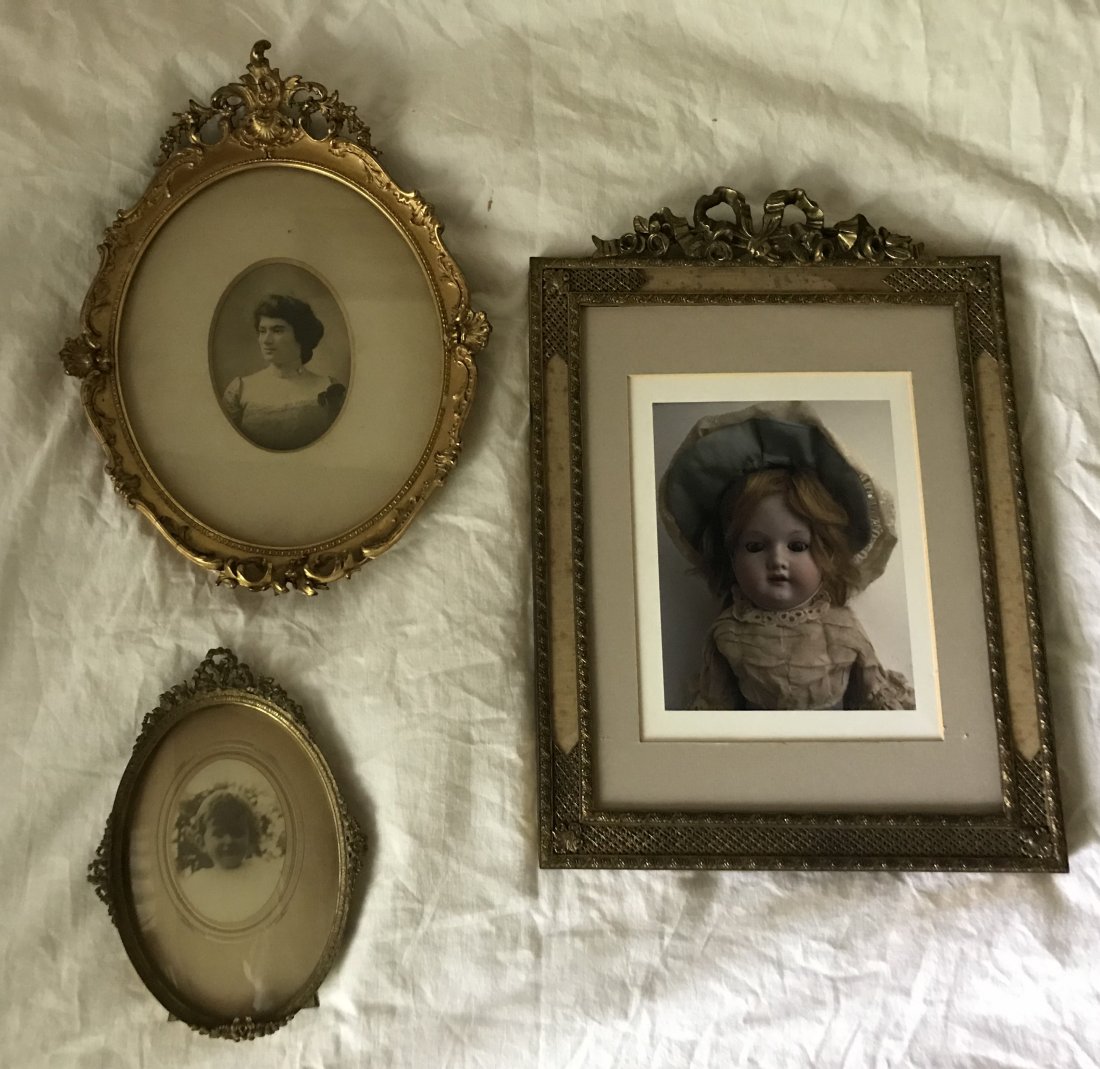 (3) Decorative Frames: 3 decorative frames w/ornate design: oval metal standing frame, pitting on back, age spots, marked James McCreery & Co, New York-8 ½” L x 6” W; oval gessoed frame, some flaking, minor loss to gil