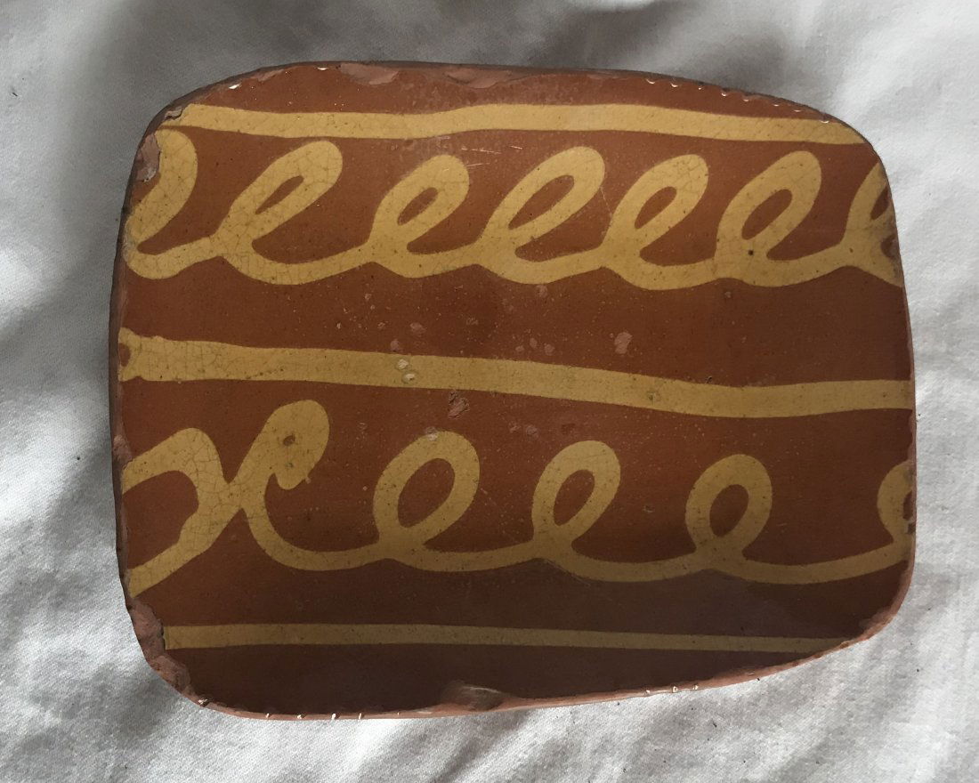 Redware Rectangular Plate: American redware small rectangular plate marked Shooner w/yellow slip decoration signed Greg Shooner, 1996, numerous rim and glaze chips, 6 5/8” x 8 ½”