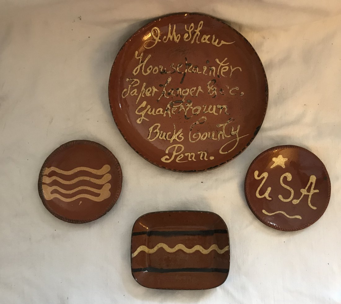 Lot 4 Pieces of Redware: Lot of 4 - Redware plate marked Turtle Creek Potters, Morrow, Ohio, yellow slip design reading J.M. Shaw, Housepainter Paperhanger, Quakertown, Bucks County, Penna., marked BABS, 1998, rim chips, 7 7/
