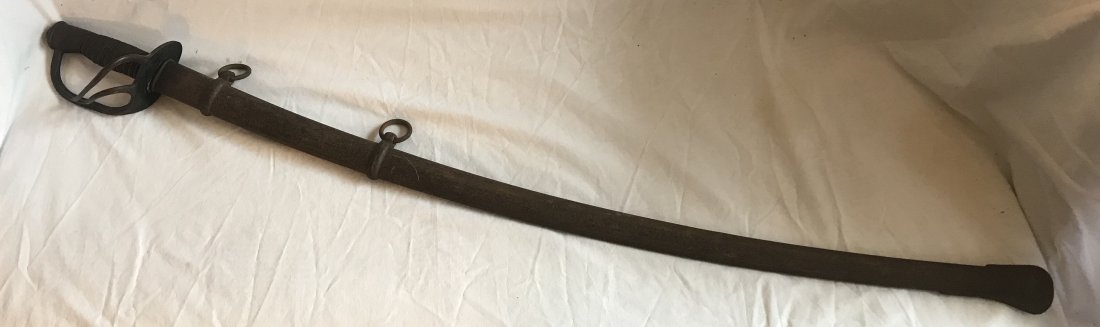 Antique Military Cavalry Sword: Antique military cavalry sword w/brass and leather hand grip marked U.S., DEW, 1865, makerÂ’s name partially worn and obscured but appears to be Emerson and Silver, Trenton, N.J., together w/origin
