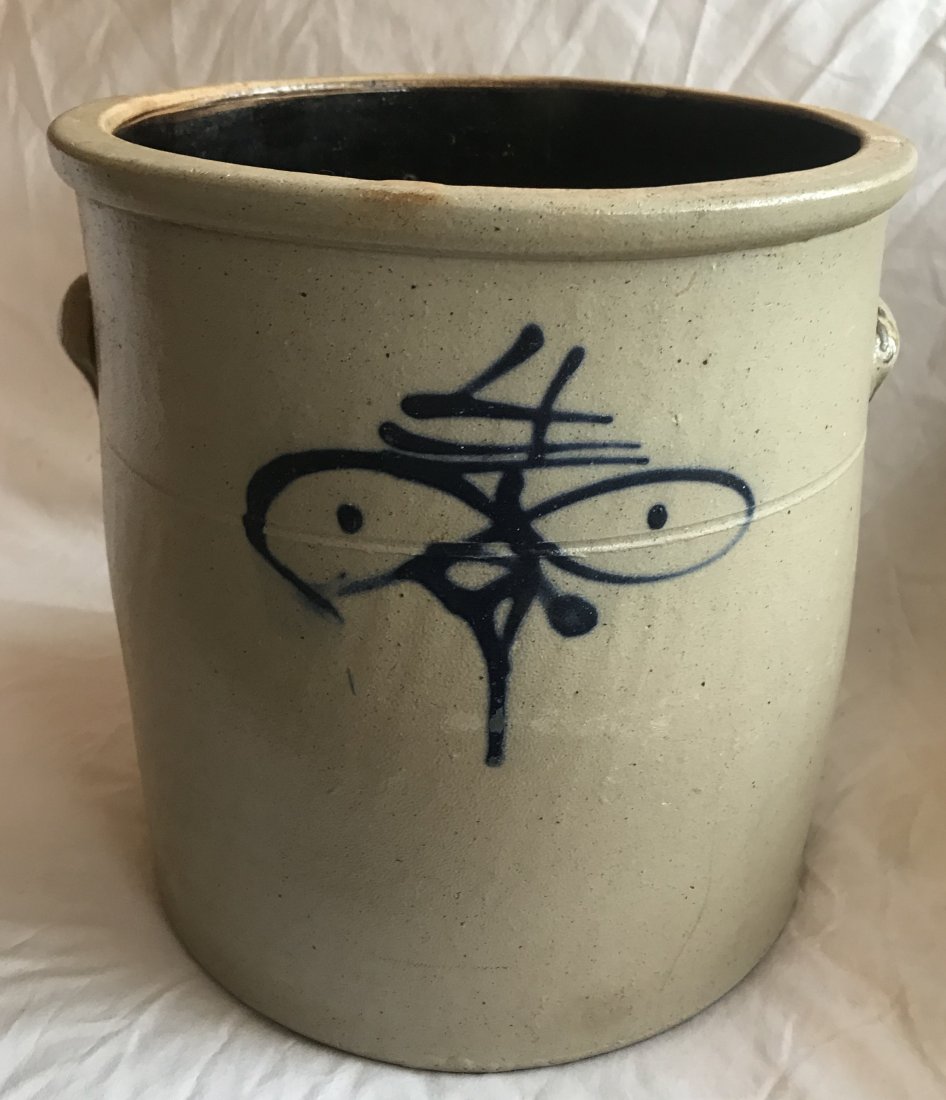 Blue Decorated Crock: Blue decorated gray stoneware 4 gallon crock, slight hairline crack visible on back, chip on right handle, overall condition good, 11 5/8” T x 10 ¾” base diameter