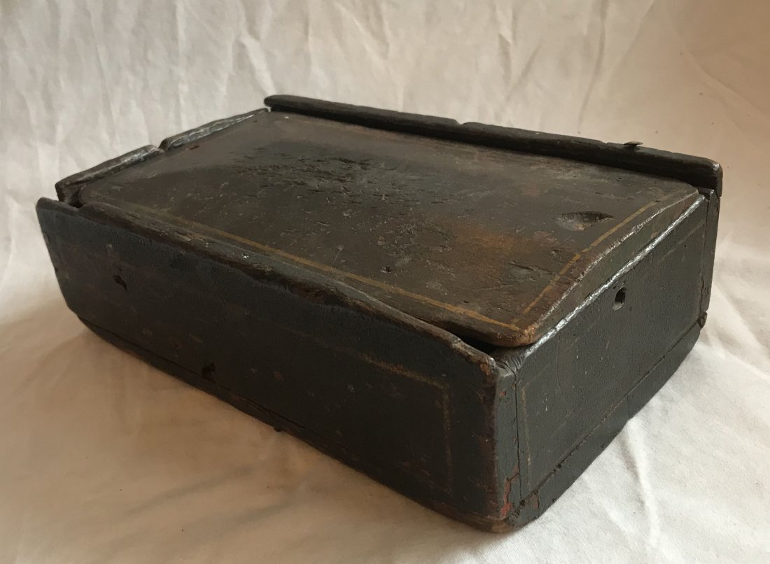 Primitive Rectangular Box: 19th century country primitive rectangular box w/sliding lid and thumb grip, ld brown finish w/yellow pin striping, old wear, splits, scratches and damage throughout, 2 ¾” T 8 ¾” L x 5 ½” W