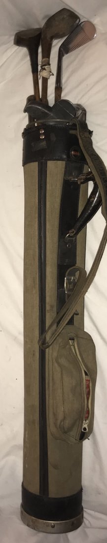 Grouping of 8 Vintage Golf Clubs: Group of 8 vintage golf clubs w/wooden shafts including: wooden driver marked Nelson Bros. Special, 43 5/8” L; wooden driver marked Hillerich & Bradsby Co., Louisville, KY, 44 ¼” L; putter marked