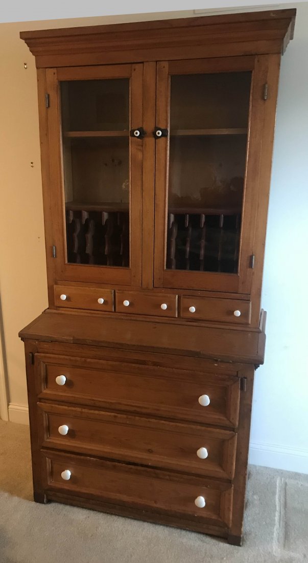 FURNITURE, ACCESSORIES, COUNTRY COLLECTIBLES, TOYS,: 19th century primitive country softwood secretary desk in 2 pieces, bookcase top with shelves over pigeonholes on a base with hinged writing surface over 3 full length drawers, porcelain knob pulls, s