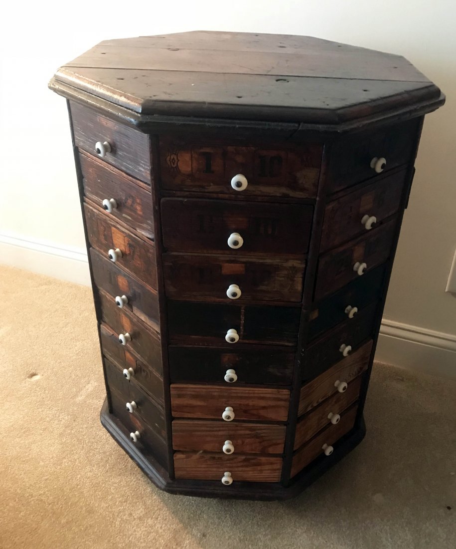 FURNITURE, ACCESSORIES, COUNTRY COLLECTIBLES, TOYS,: Late 19th/early 20th century octagonal hardware store/general store multi-drawer swivel cabinet, total of 64 drawers all with porcelain knob pulls, many drawers with stenciled numbers on fronts, 6 dra