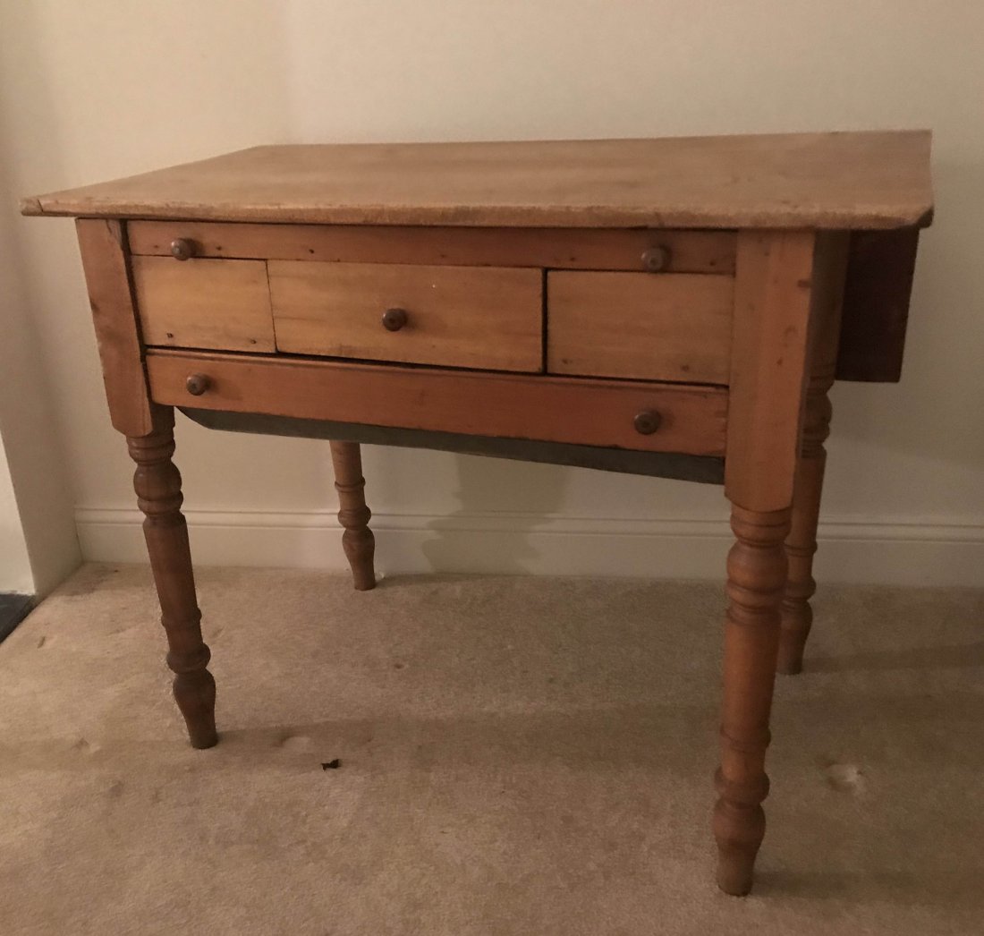 FURNITURE, ACCESSORIES, COUNTRY COLLECTIBLES, TOYS,: Primitive country softwood baker’s table, rectangular top with rear drop leaf over a sliding breadboard, 1 short center drawer and 1 full length dough drawer with tin on turned legs, natural finish,