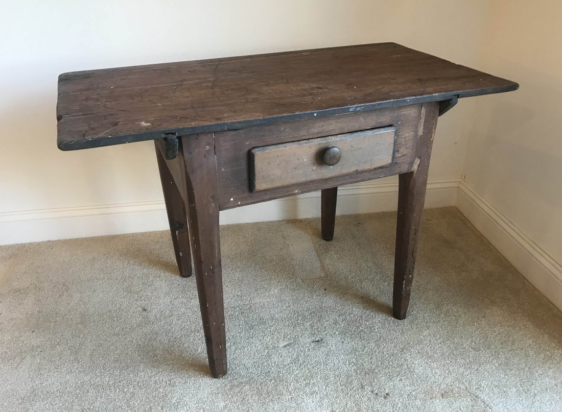 FURNITURE, ACCESSORIES, COUNTRY COLLECTIBLES, TOYS,: Primitive country table with removable rectangular top (pegs missing) on a base with 1 drawer ending on square tapered legs, old finish with old wear and tear, 26” T x 39” W x 21” D