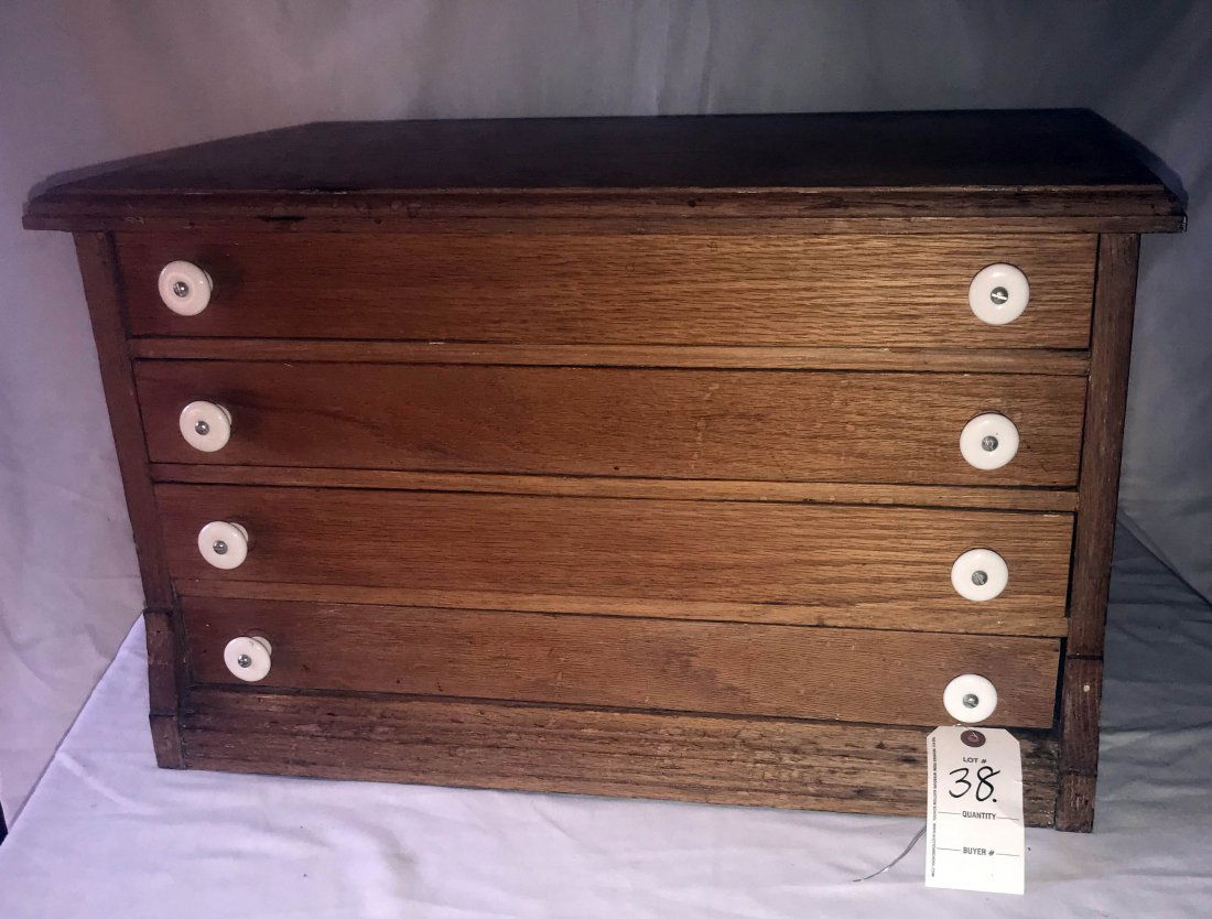 FURNITURE, ACCESSORIES, COUNTRY COLLECTIBLES, TOYS,: Late Victorian oak spool cabinet, molded top over 4 full length drawers w/white knob pulls, faded, worn surface, 14 1/2" T x 24 1/2" W x 16" D