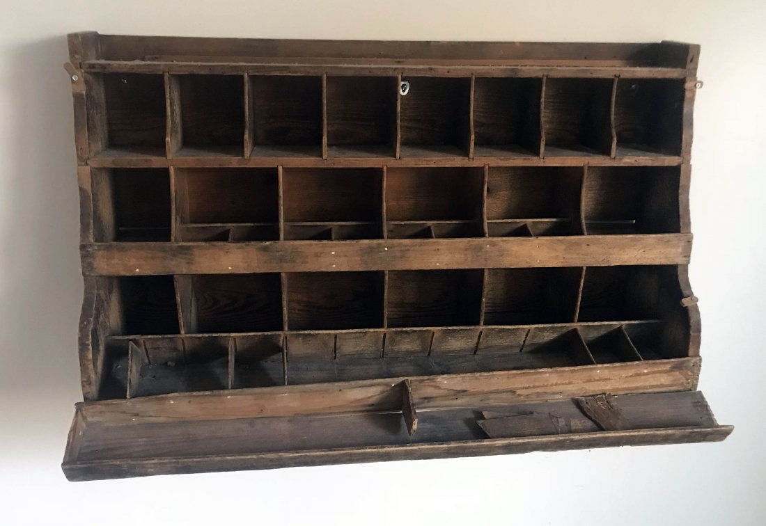 FURNITURE, ACCESSORIES, COUNTRY COLLECTIBLES, TOYS,: Country primitive softwood wall mounted pigeonhole cabinet w/3 tiers and bottom shelf, base shelf and dividers are damaged and need repair, old natural finish, 18 5/8" T x 33" W x 12" D