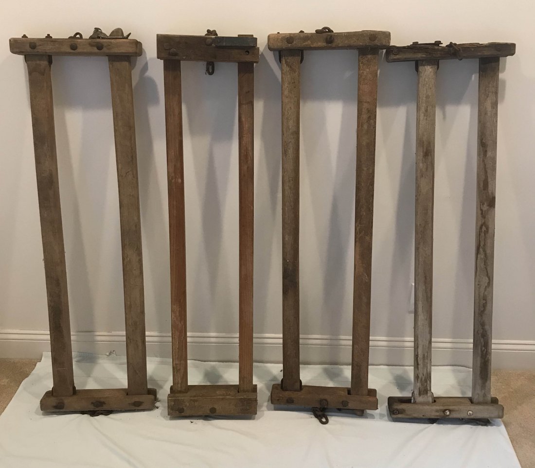 FURNITURE, ACCESSORIES, COUNTRY COLLECTIBLES, TOYS,: (4) antique wooden cow stanchions w/iron chains, latches and mounts, 1 marked Dunbar Forrestville, Conn., none are identical, 1 shows decaying wood at end, varying heights from 47 1/2" T - 47" T; vary