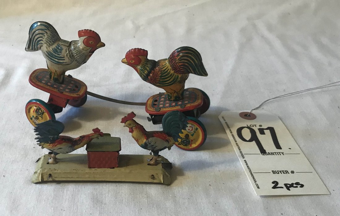FURNITURE, ACCESSORIES, COUNTRY COLLECTIBLES, TOYS,: Tin litho windup double chicken figure on wheels, some minor scratches and wear, 3 1/2" T x 6" L; tin mechanical penny toy-pair of chickens pecking at a box, marked Germany, 2 1/4" T x base-4" L