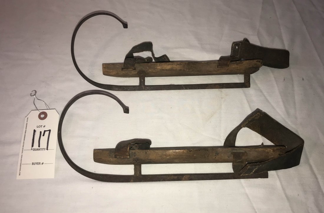 FURNITURE, ACCESSORIES, COUNTRY COLLECTIBLES, TOYS,: Pair of antique wrought iron and wooden ice skates w/leather straps, each 5 1/4" T x 12 3/4" L
