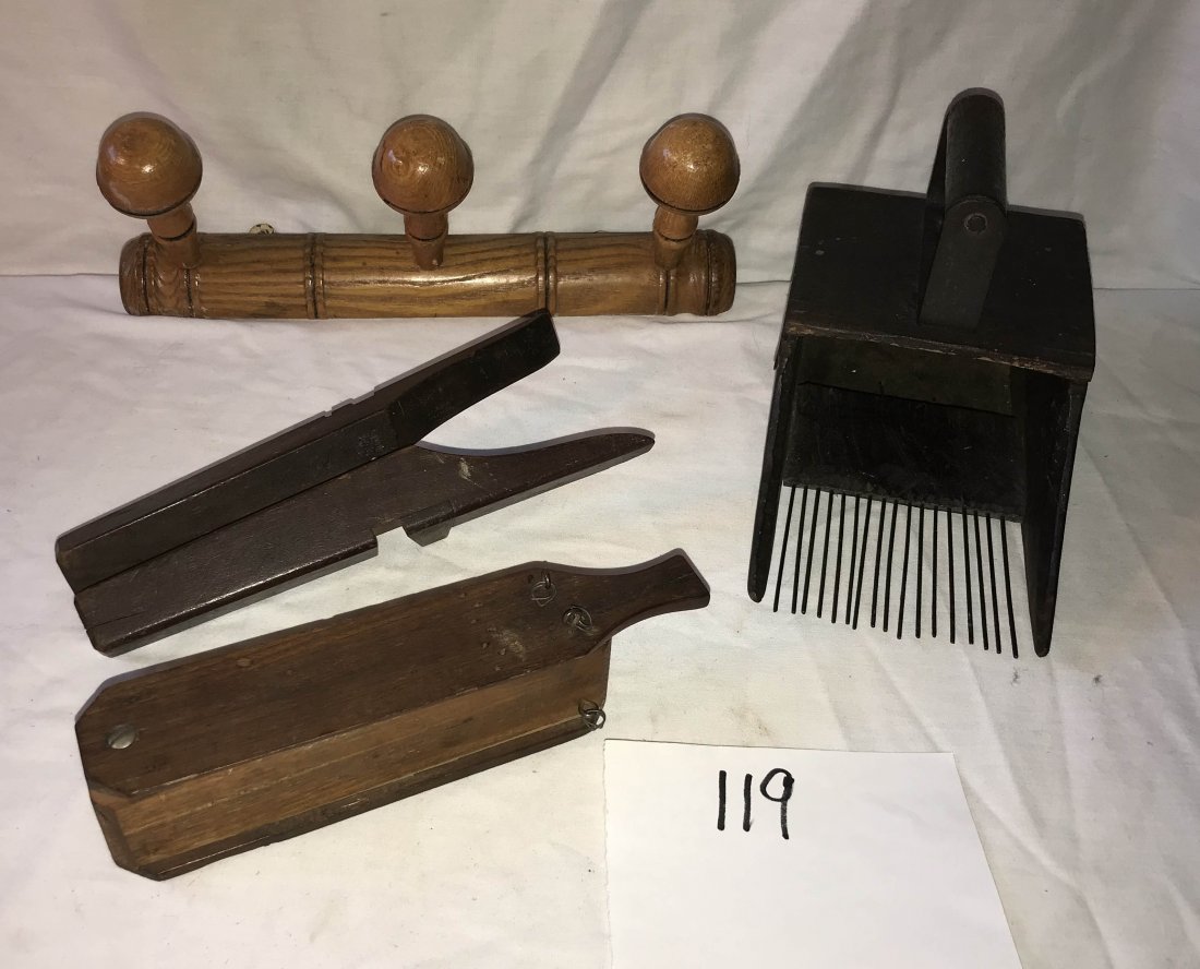 FURNITURE, ACCESSORIES, COUNTRY COLLECTIBLES, TOYS,: Country grouping: a small primitive wooden berry scoop w/handle, metal prongs and tin base, 6 1/4" T x 5 1/4" W x 9 3/4" L; wooden turkey call, 2" T x 9 1/4" L x 2" W; small wooden folding boot jack, 