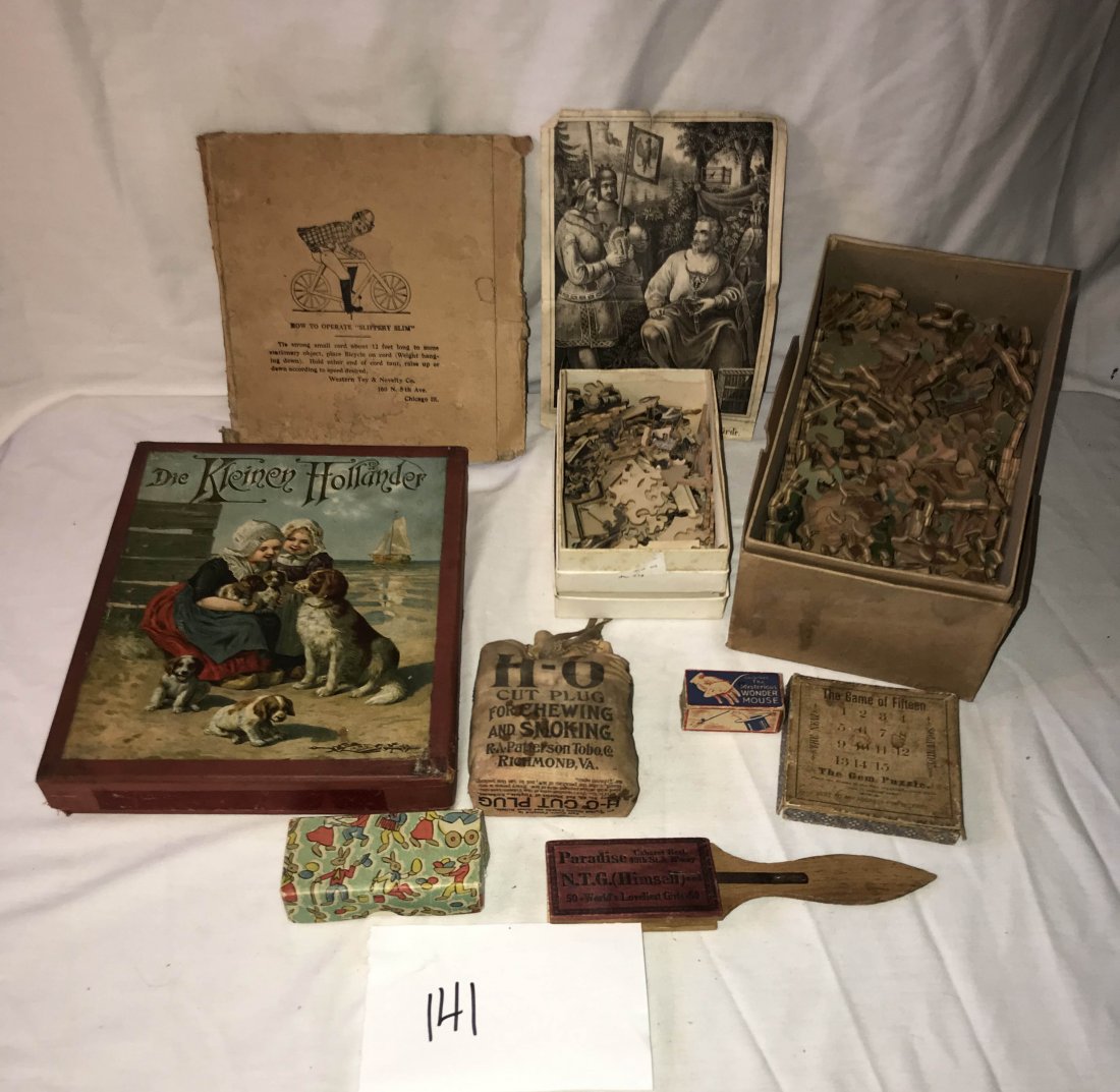 FURNITURE, ACCESSORIES, COUNTRY COLLECTIBLES, TOYS,: Miscellaneous grouping of puzzles and advertising items: (6) jigsaw puzzles in a box w/children and dog marked Die Kleinen Hollander, J.W.S and S, Bavaria, box-10 3/4" x 8 1/2"; wooden jigsaw puzzle i