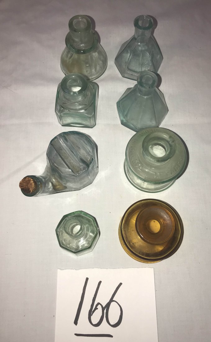 FURNITURE, ACCESSORIES, COUNTRY COLLECTIBLES, TOYS,: Grouping of 8 vintage ink bottles: octagonal shape, square, round-1 marked LePage's, amber marked Dansk Designs Ltd; snail form w/pen holder top; some bottles do show roughness/chips