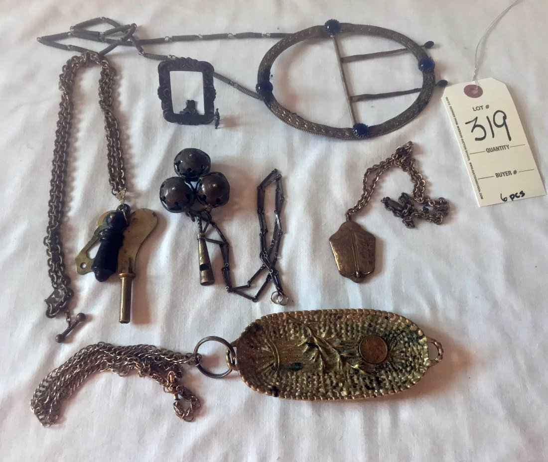 HANDCRAFTED JEWELRY, STERLING AND PLATED SILVER,: Grouping of items: metal oval four footed base w/handle, wheat sheaf design, 1893 Indian Head penny, made into neckware, 5 3/4" L; tin/metal hand held triple rattle w/whistle handle on watch chain, ra