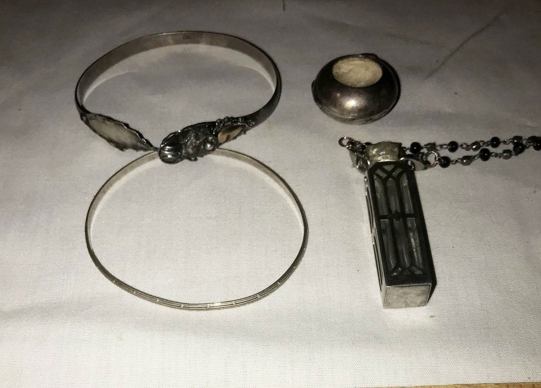 HANDCRAFTED JEWELRY, STERLING AND PLATED SILVER,: Grouping of sterling silver pcs.: (2) bangle bracelets-1 plain marked Danecraft, 1 w/ornate clasp, small oval gold insert, marked .925; round rosin holder w/hinged lid; glass perfume bottle w/sterling