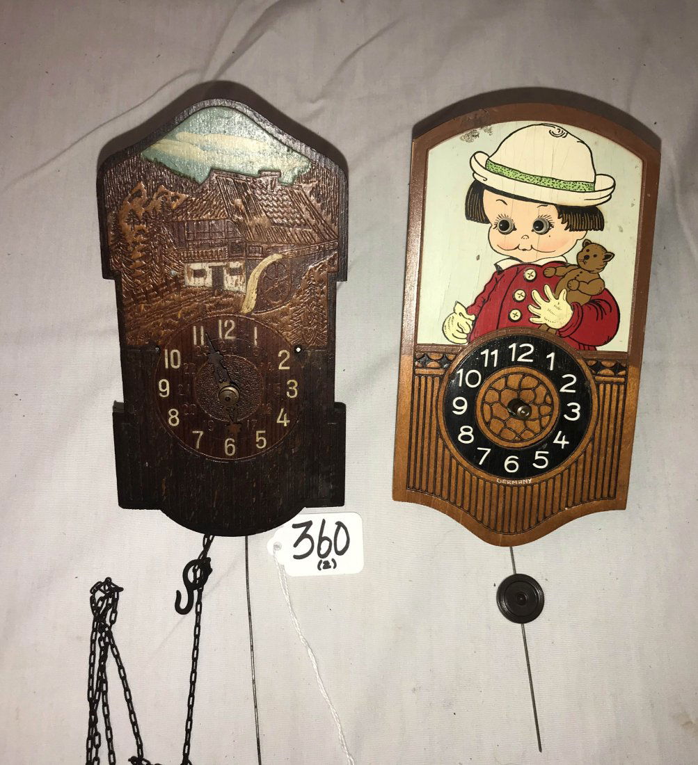 HANDCRAFTED JEWELRY, STERLING AND PLATED SILVER, CLOCKS: (2) Clocks: wooden wag-on-the wall w/carved chalet and water wheel design w/pendulum, no weight, 7 1/4" T; German wag-on-the wall w/child holding a teddy bear having a brass movement marked O. Mitzkat