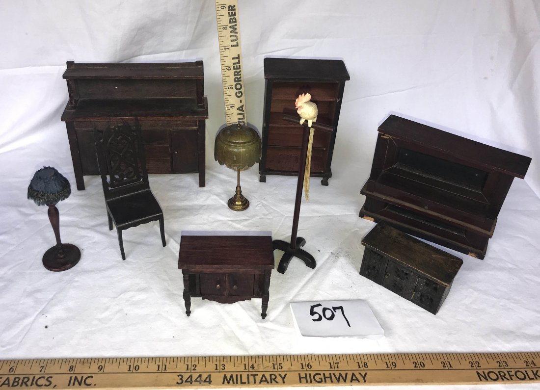 DOLLHOUSES, DOLLS, MINIATURES: Grouping of 9 pieces of living room dollhouse furniture: sideboard w/shelf top, Victorian side chair, cockatoo on stand, table lamp, server, Jacobean cabinet, brass/tin table lamp, upright piano, book